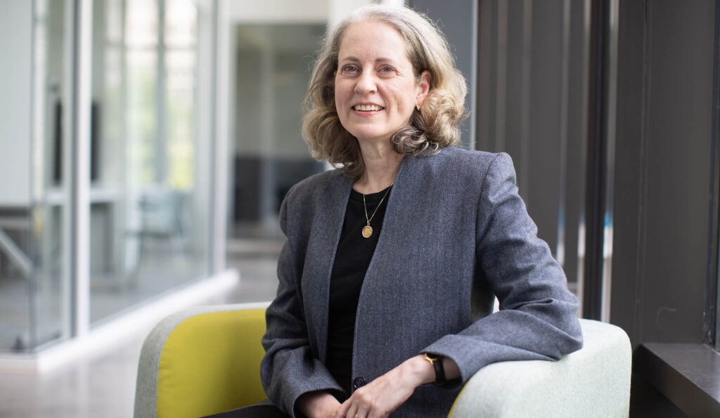 Dr. Kathryn McClymond, seated in Cousins Center